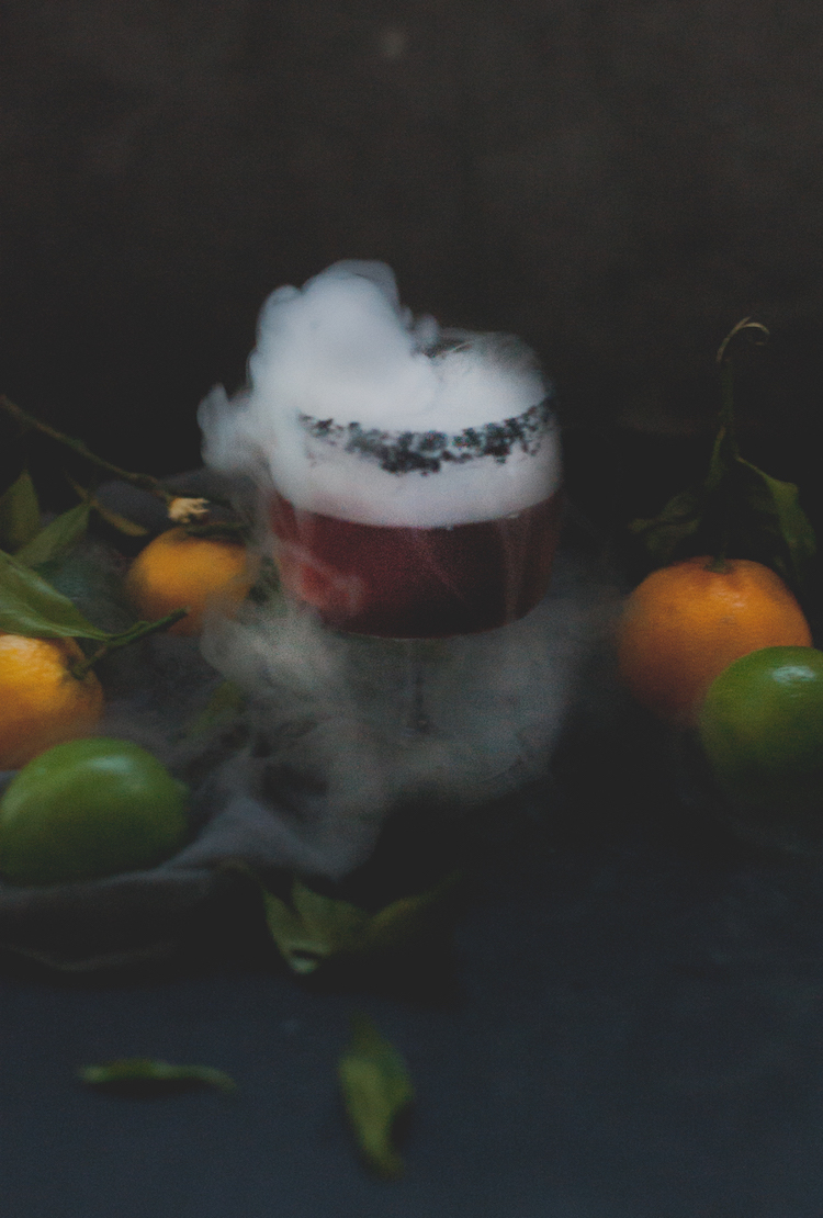 A Smokey Mezcal Halloween Cocktail with dry ice // Craftandcocktails.co