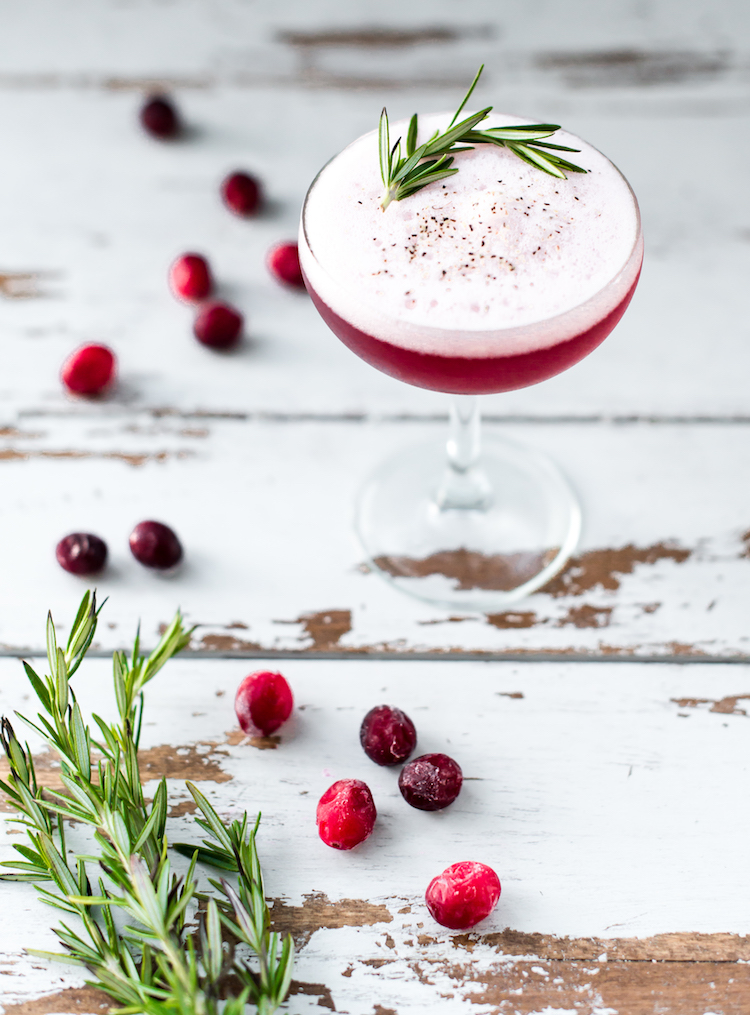 Pepper & Berries cocktail with cranberry and rosemary// craftandcocktails.co