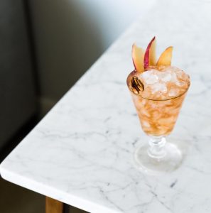 Bitter Pecan Peach Dandy cocktail | recipe on Craftandcocktails.co