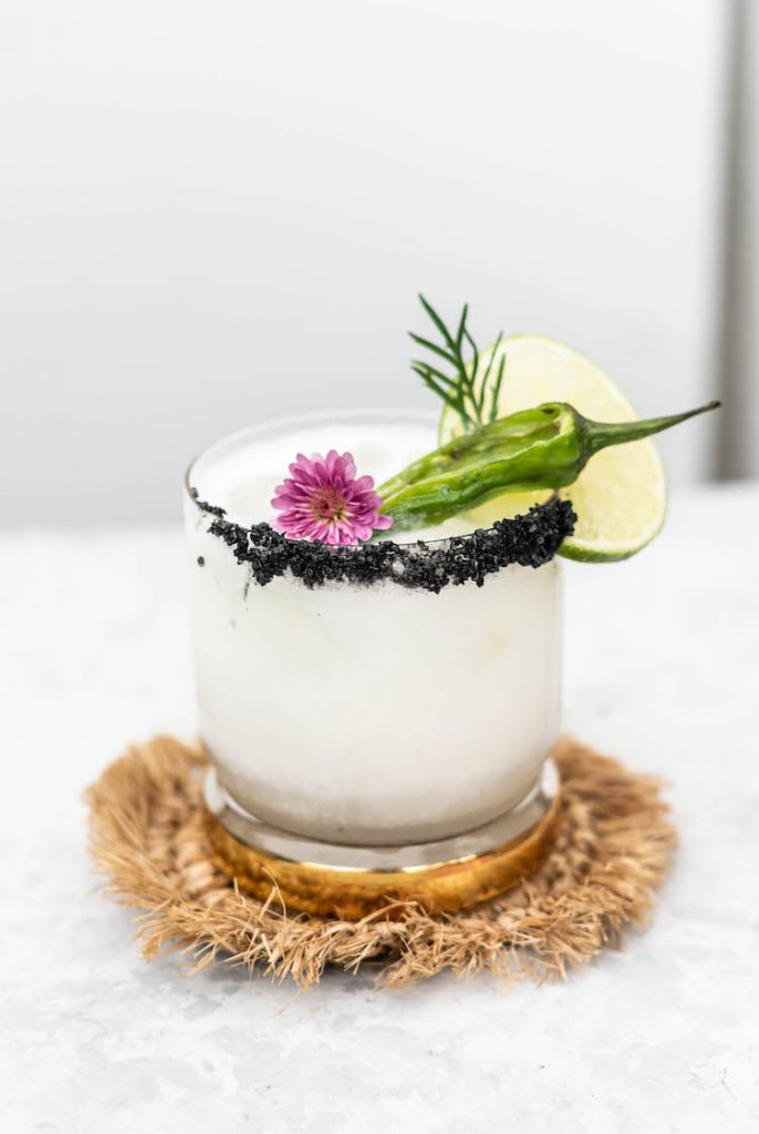 The Coconut Jalapeño Margarita is a spicy, tropical twist on the classic tequila cocktail. Spicy jalapeño is tempered by cooling coconut for a refreshing, but zippy sip. 