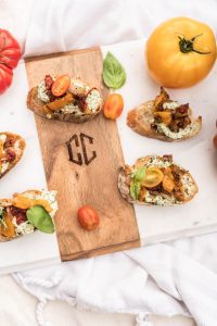 Tomato Pepper Toasts with Whipped Basil Goat Cheese