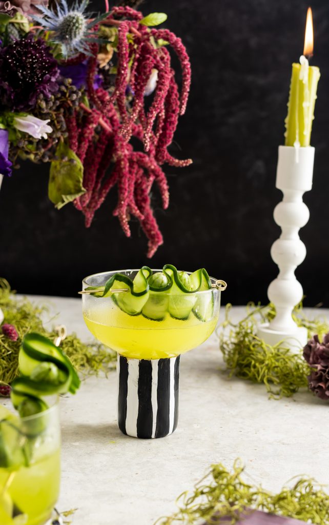 Beetlejuice cocktail recipe with cucamelon garnish